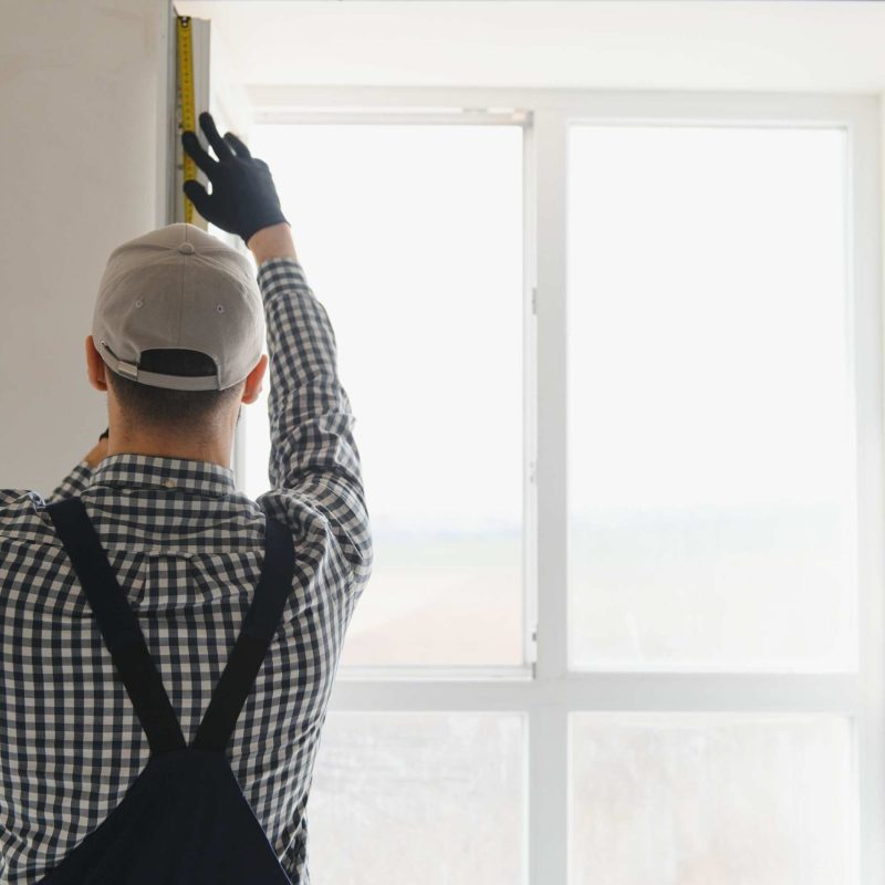 workman-in-overalls-installing-or-adjusting-plasti-2024-02-08-19-08-46-utc workman-in-overalls-installing-or-adjusting-plasti-2024-02-08-19-08-46-utc